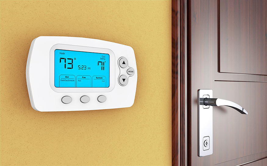 Photo of thermostat check for HVAC Maintenance